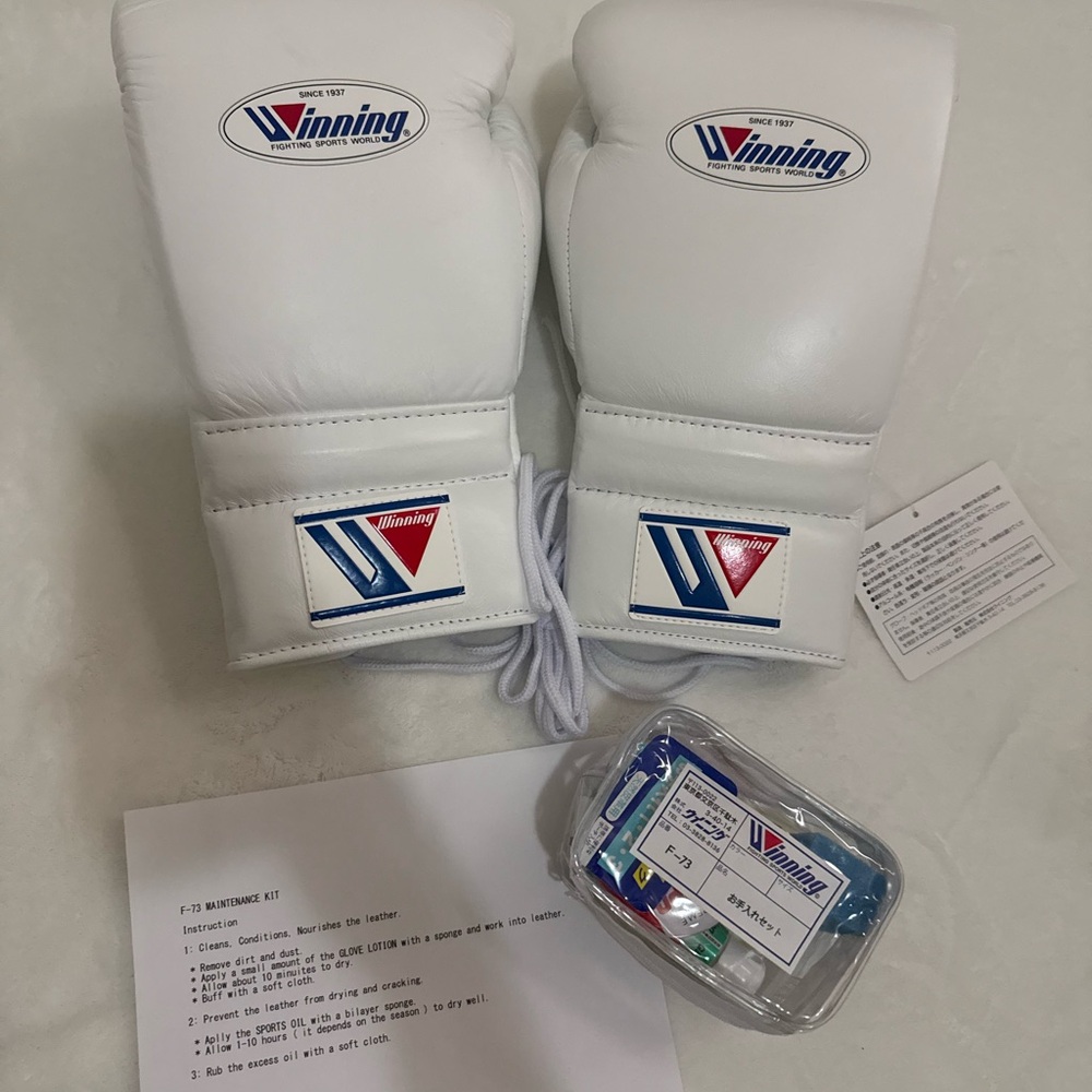 Winning White Boxing Gloves